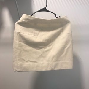 Light cream color 80% wool material